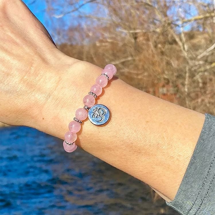 Kristallpunkten Rosenkvarts (AUM) 8mm pärlor Armband
