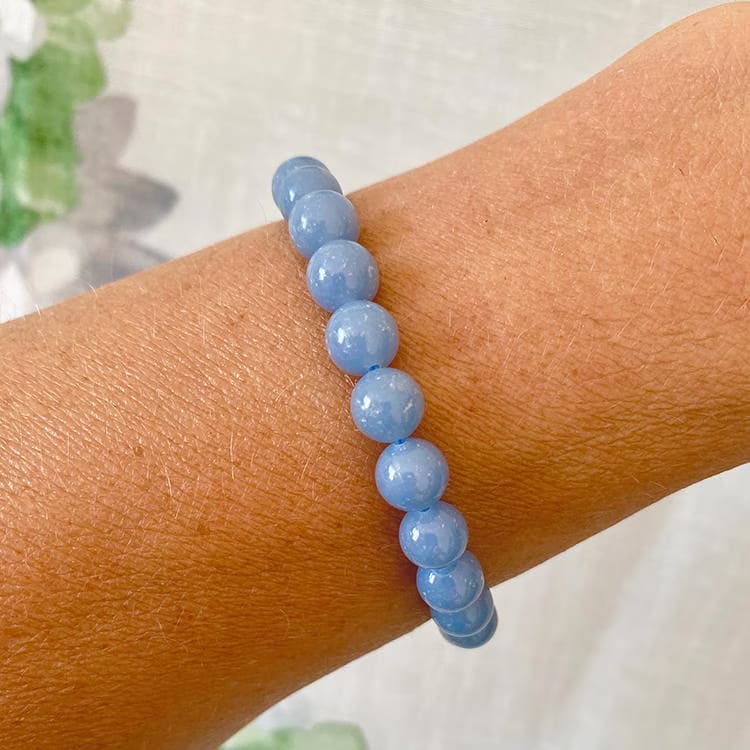 Kristallpunkten Angelit 8mm pärlor Armband