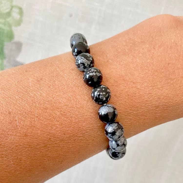 Kristallpunkten Obsidian Snöflinge 8mm pärlor Armband