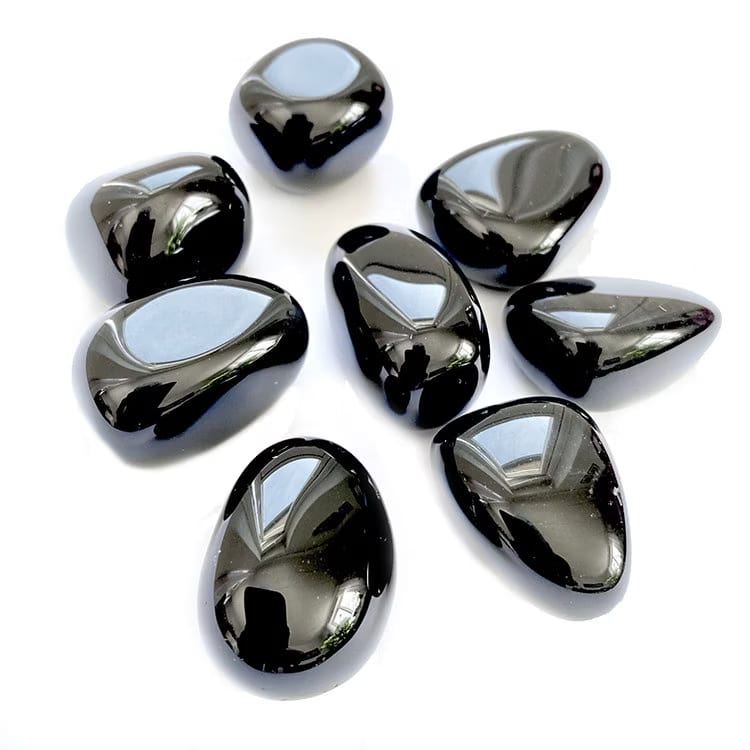 Kristallpunkten Obsidian Svart AA Trumlade stenar 100gr