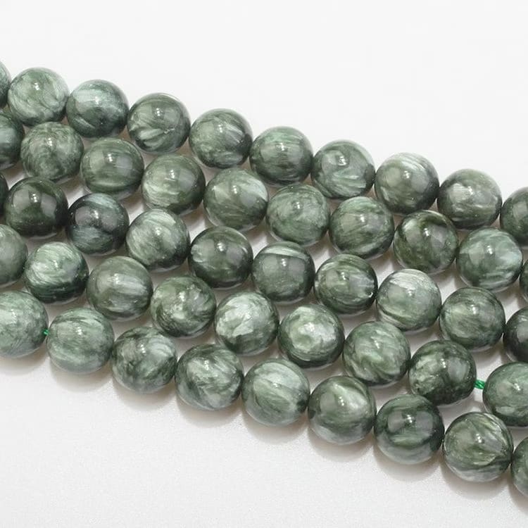 Kristallpunkten Serafinit 8mm pärlor Armband