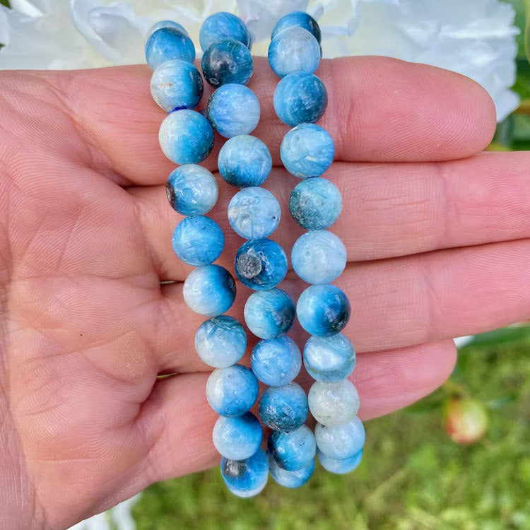 Kristallpunkten Blue Ice Nakauriit 8mm pärlor Armband